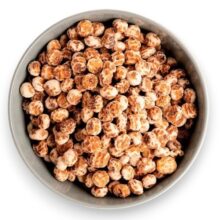 Bowl of roasted chickpeas seasoned with spices, ready to snack