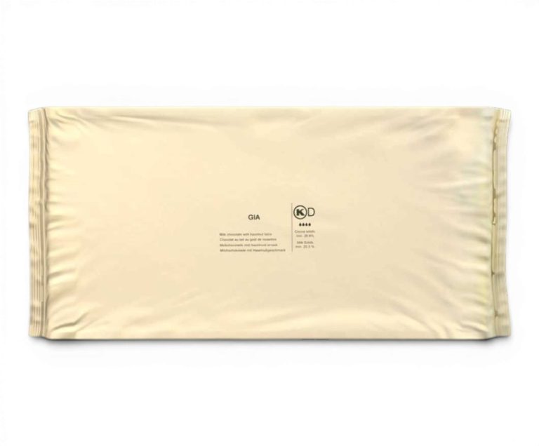 Flat, sealed beige snack-bar wrapper lying on a white background with small center logos and text for branding