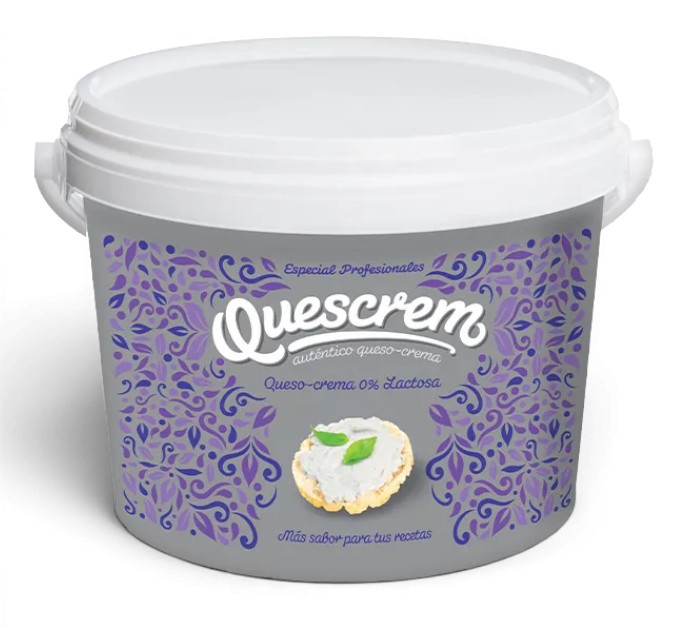 Tub of Quescrem queso crema with a purple ornamental label and white lid; text notes 0% lactose and a small cracker topped with cream inside.